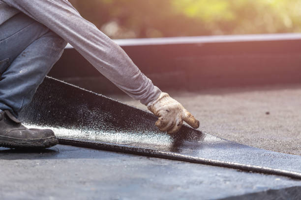 Professional Basement Waterproofing technician working in Midland, OH